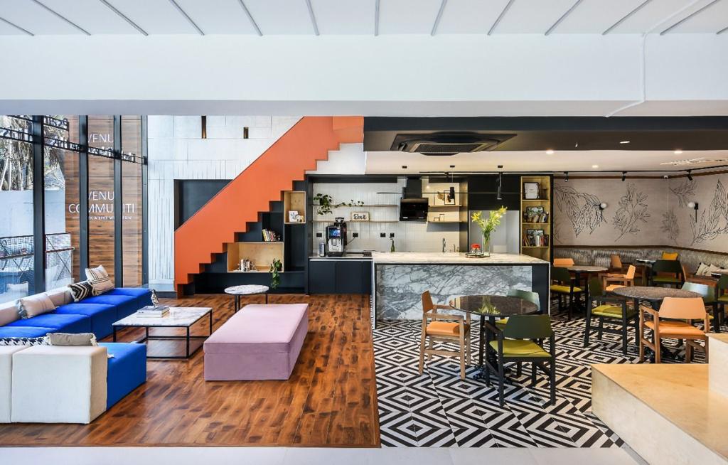 Venus Community Co-Work Lounge — Open-plan workspace with eclectic design